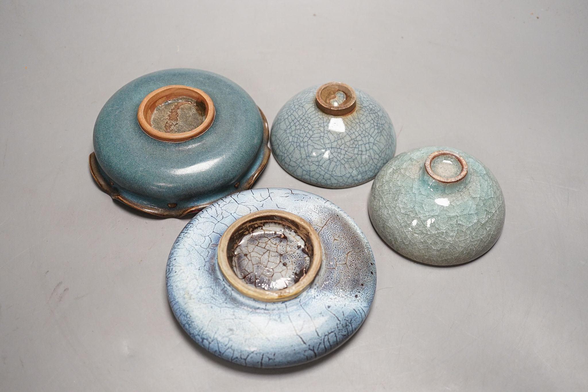 Four Chinese Jun type dishes/bowls, largest 14 cms diameter.